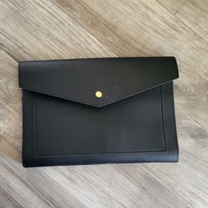 Glass ladder & company black vegan pebble leather . Megan Portfolio